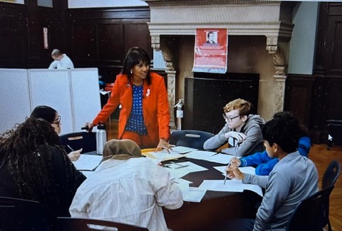 Theresa with students